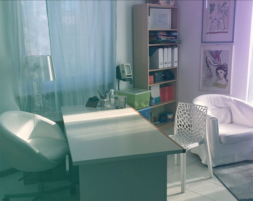 Professional office with desk and armchairs